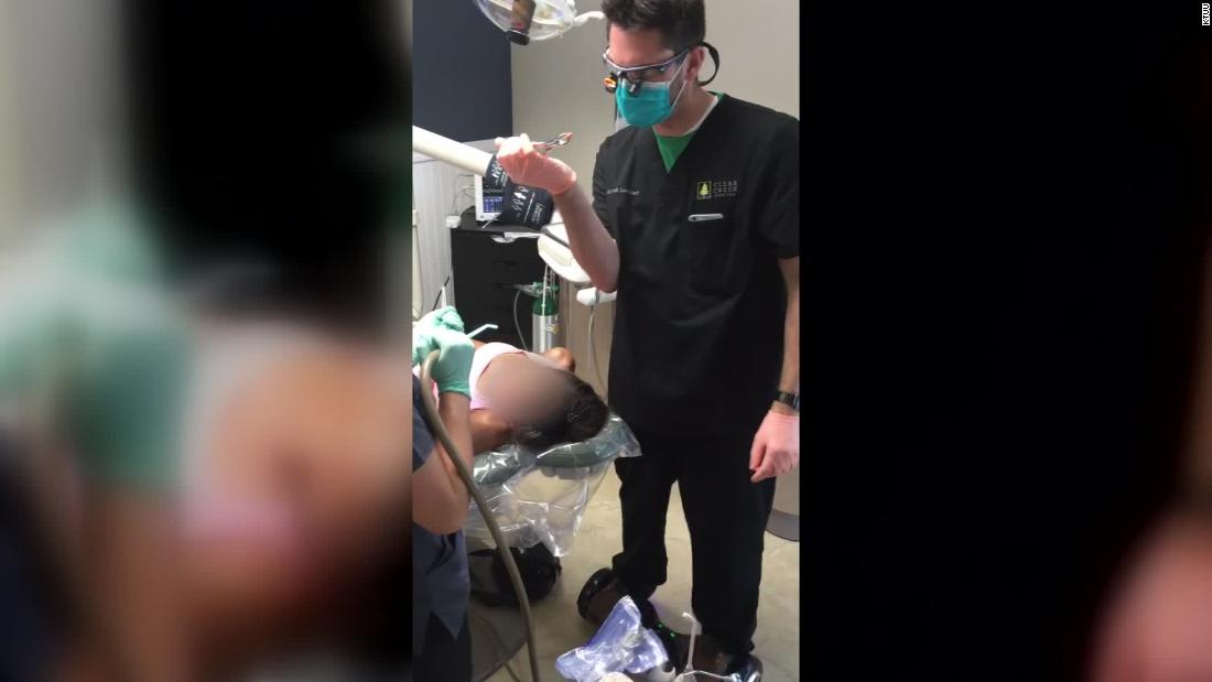 Alaska dentist was filmed riding a hoverboard while extracting a patient's tooth