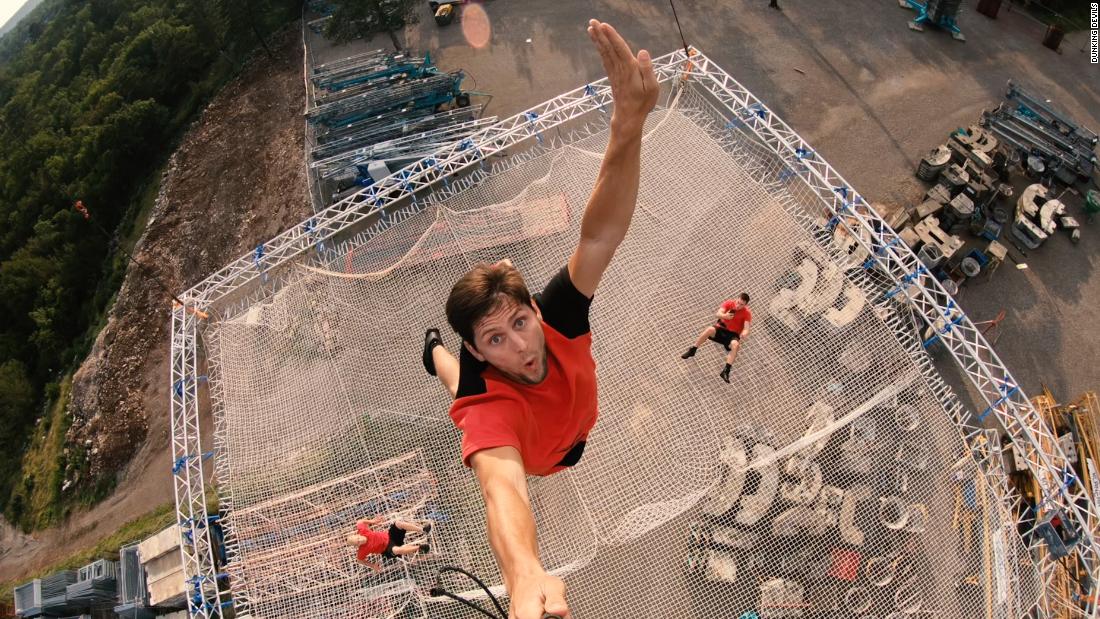 Dunking Devils: Acrobatic daredevils perform on world's largest trampoline